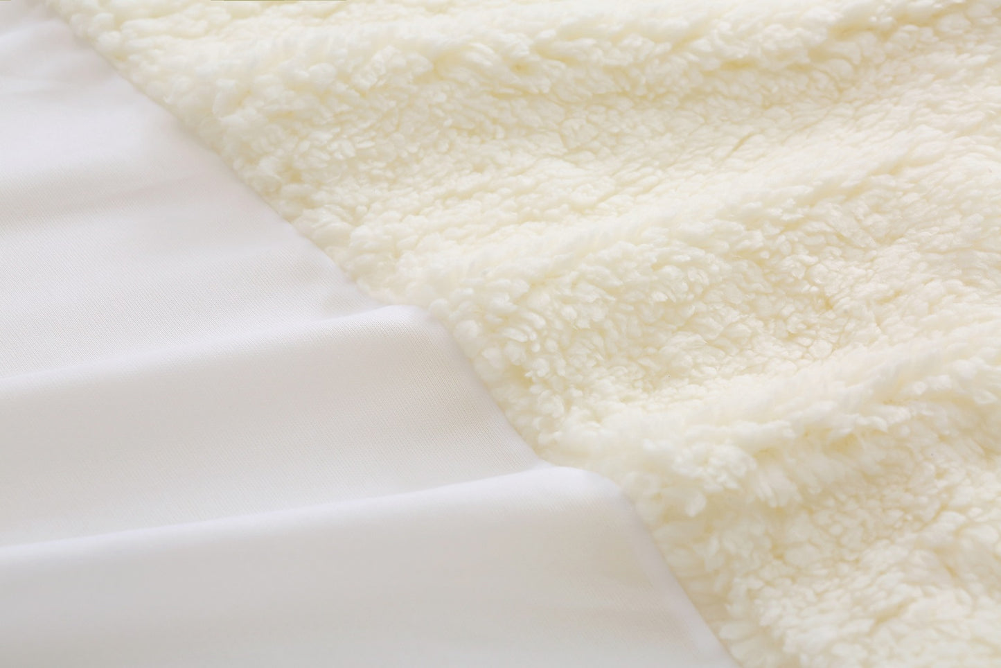 Fleecy under blanket.