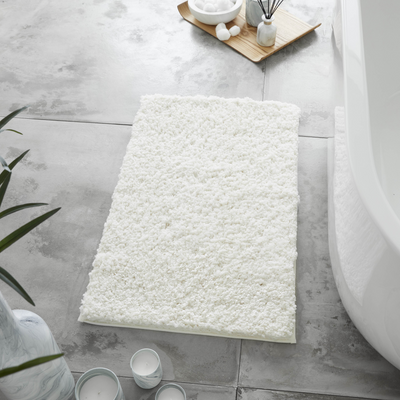 White fluffy bath outlet mat